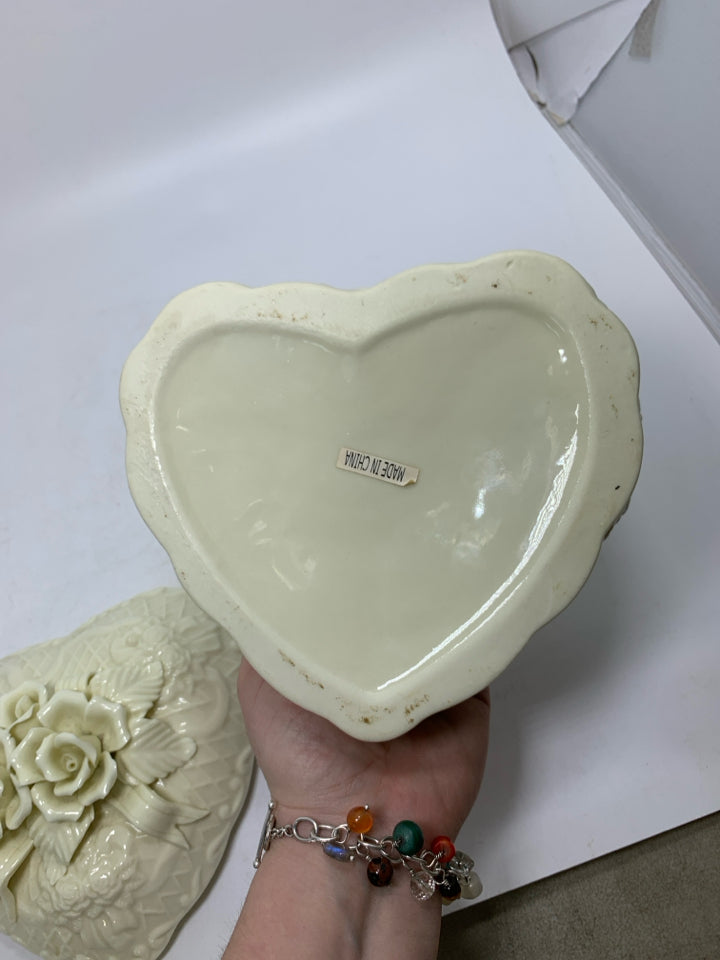 CERAMIC HEART SHAPED CANISTER W/ EMBOSSED ROSES & RIBBON.