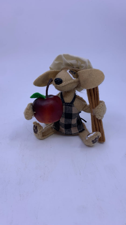 ANNA LEE FELT DOG HOLDING APPLE AND CINNAMON.