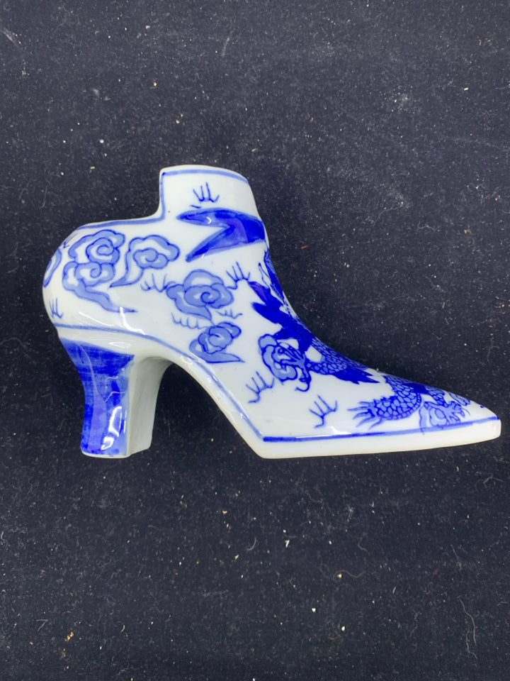 BLUE AND WHITE SHOE PLANTER.