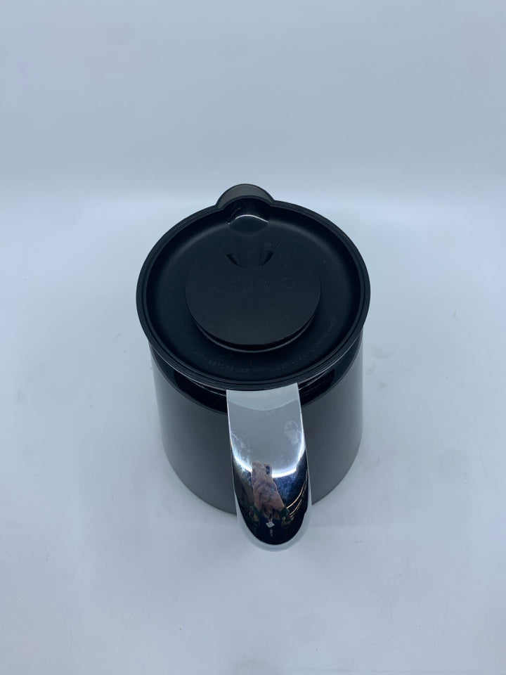 BLACK PLASTIC KEURIG CARAFFE.