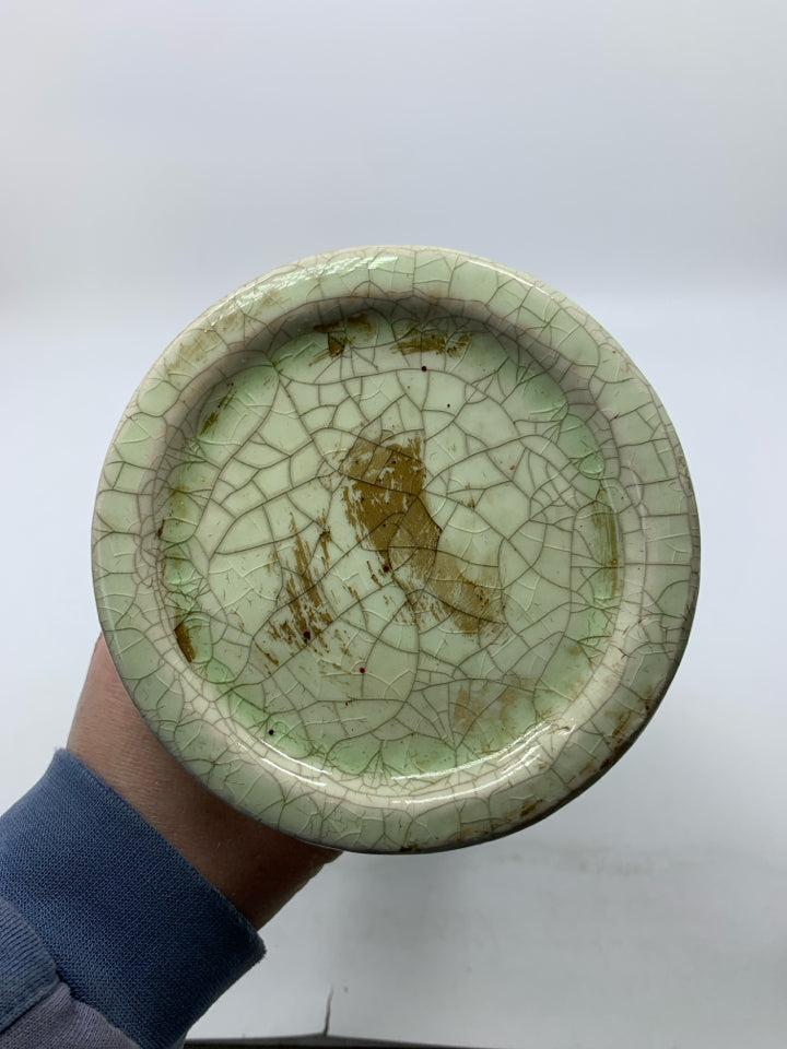 LIGHT GREEN CERAMIC CRACKLE DETAIL PILLAR CANDLE HOLDER.