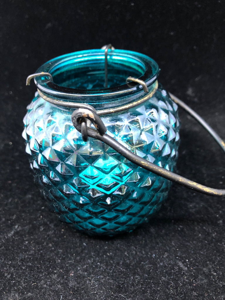 TEAL GLASS LANTERN TEA LIGHT HOLDER.