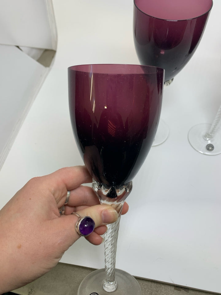 4 DARK PURPLE CRYSTAL WINE GLASSES W/ CLEAR STEMS.