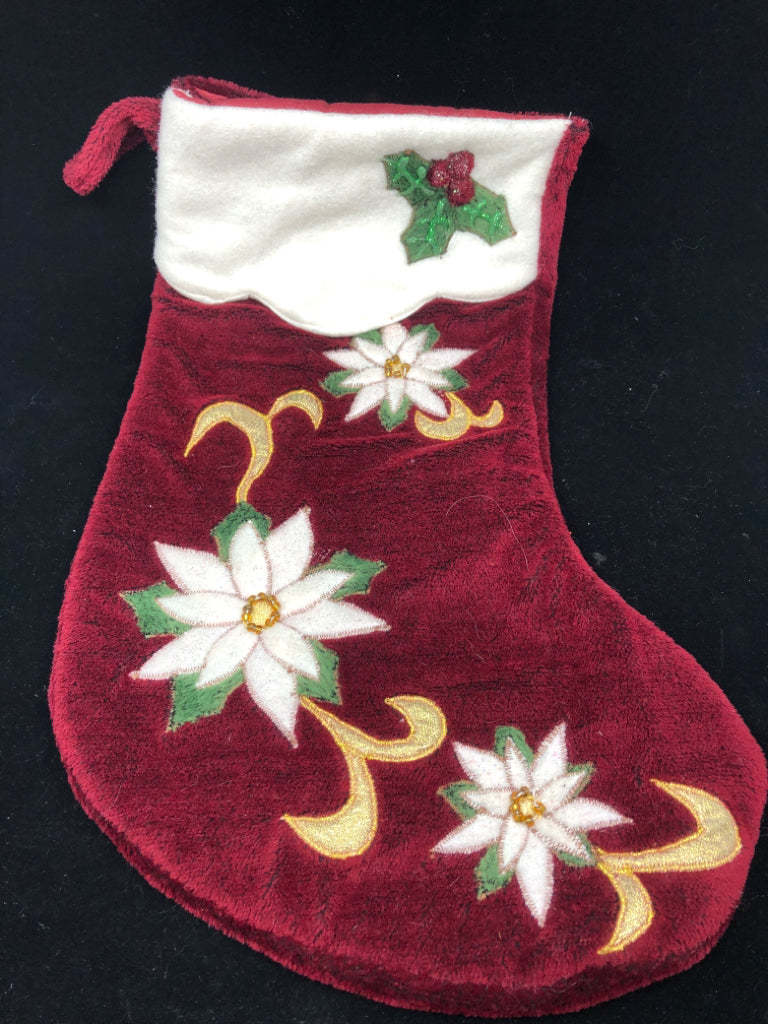 RED W WHITE POINSETTIA STOCKING.