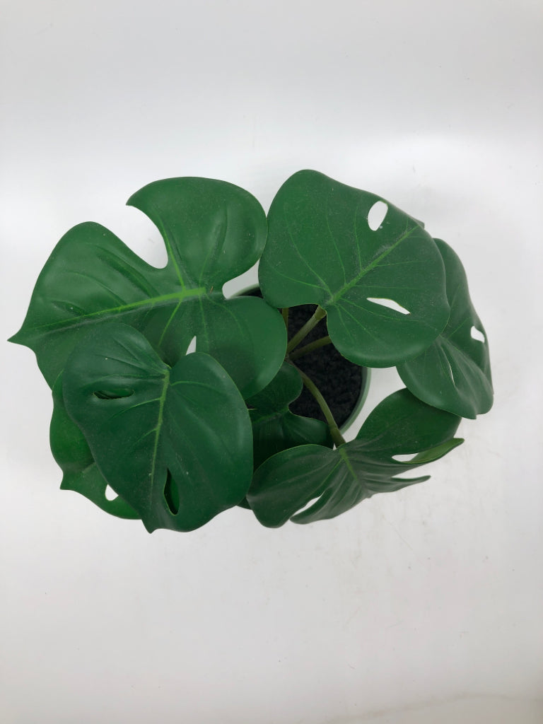 FAUX MONSTERA IN TEAL PLANTER.