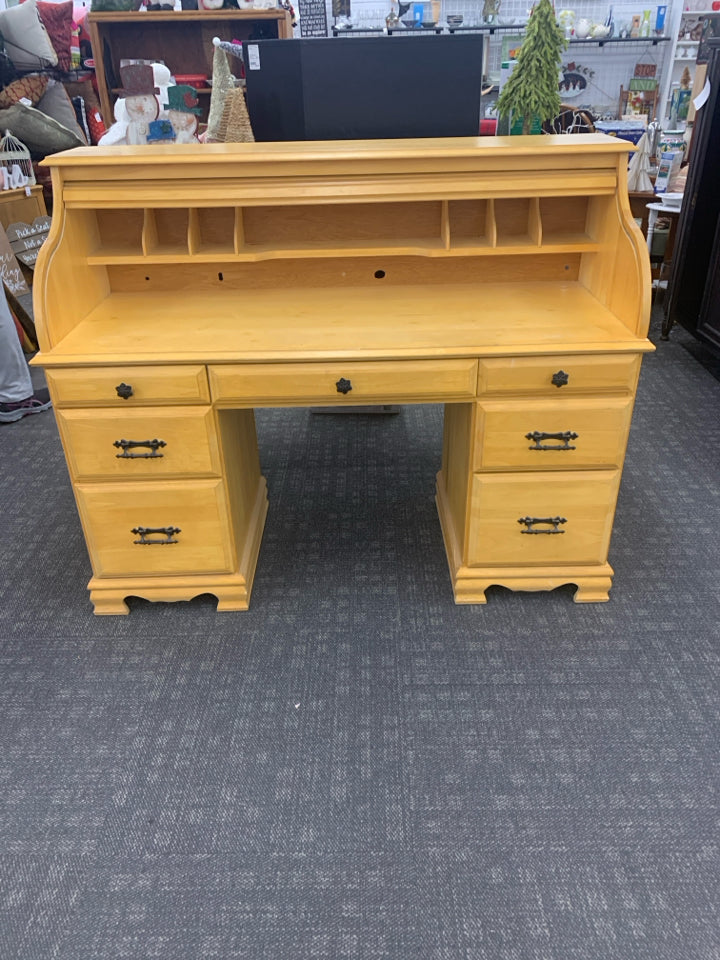 7 DRAWER BLONDE OAK ROLL TOP DESK.