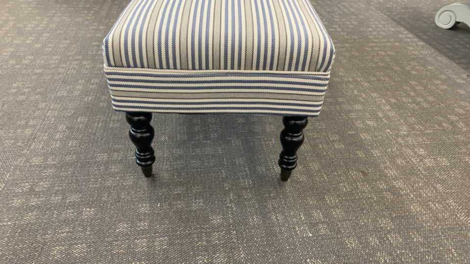 LONG BLUE STRIPPED OTTOMAN/BENCH ON WHEELS.