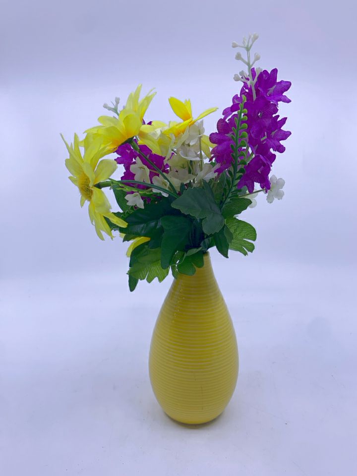 YELLOW AND PURPLE FAUX FLORAL IN YELLOW VASE.