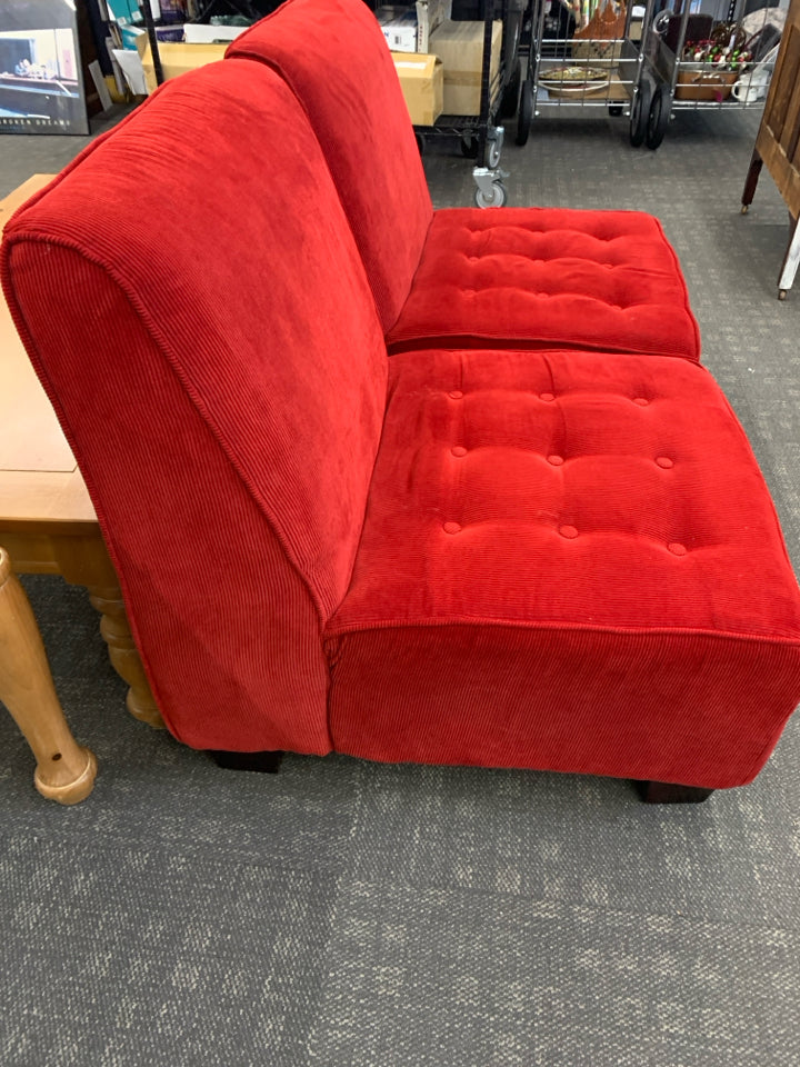 2 RED CORDUROY ARMLESS ACCENT CHAIRS.