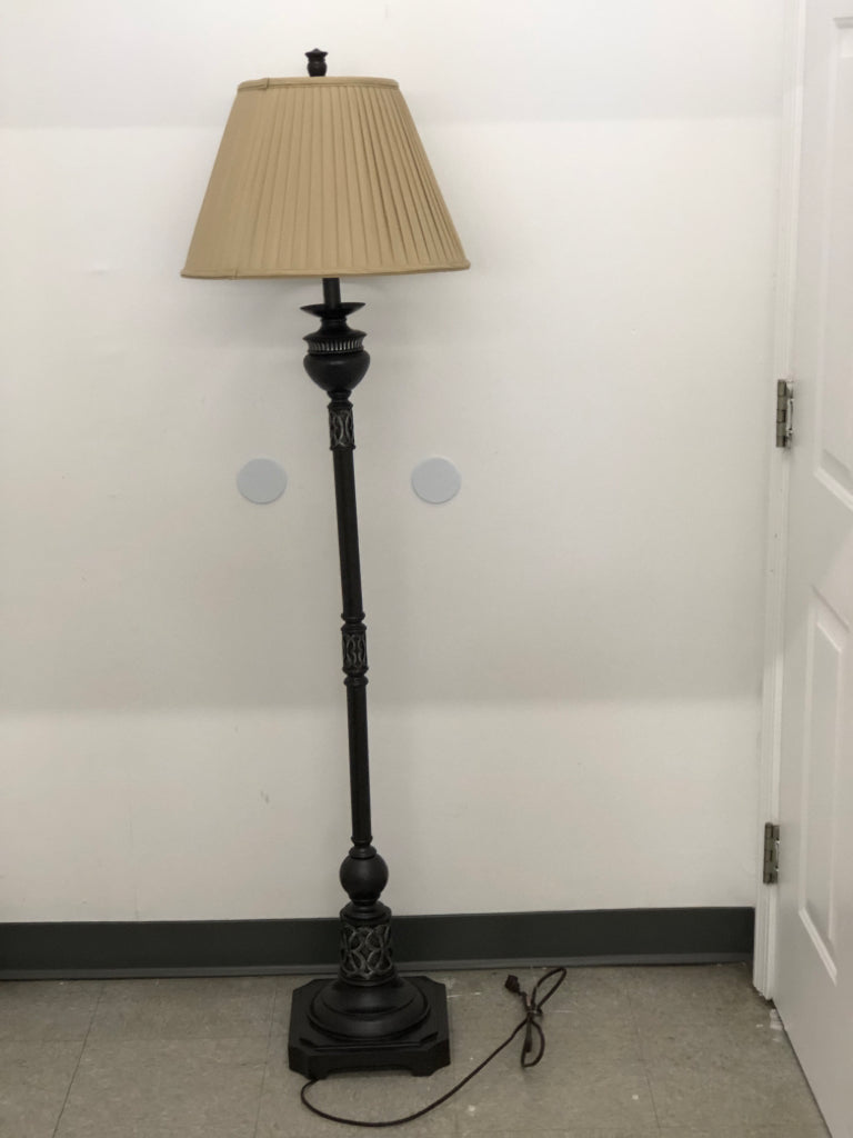 DK BROWN BASE FLOOR LAMP W/METALLIC CIRCLE DETAILS TAN RIBBED SHADE.