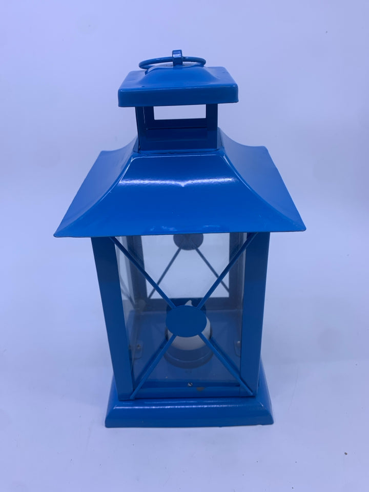 BLUE METAL TEA LIGHT LANTERN.