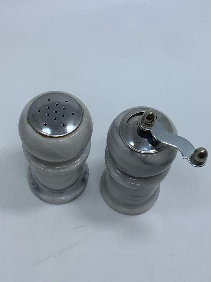 WHITE MARBLE SALT SHAKER AND PEPPER GRINDER.