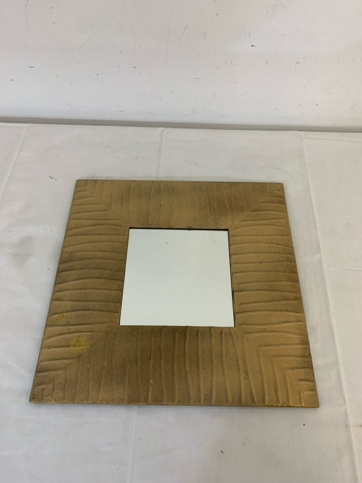 TEXTURED TAN SQUARE METAL MIRROR.