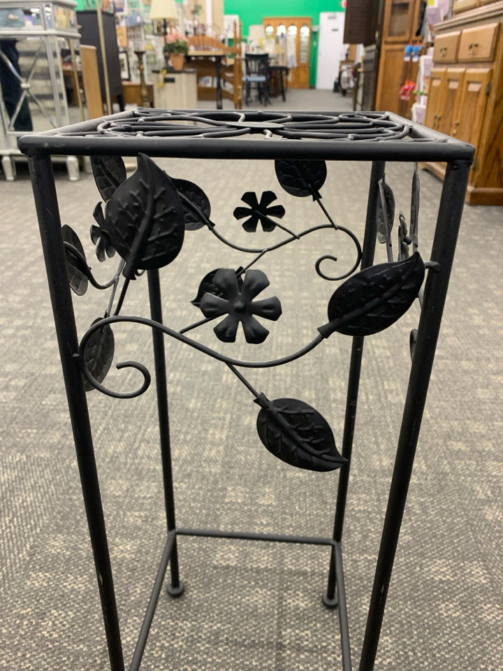 BLACK METAL PLANT STAND W/FLORAL DECOR.