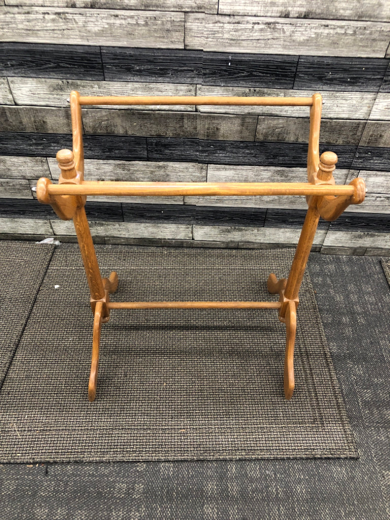 BLONDE WOOD BLANKET RACK.