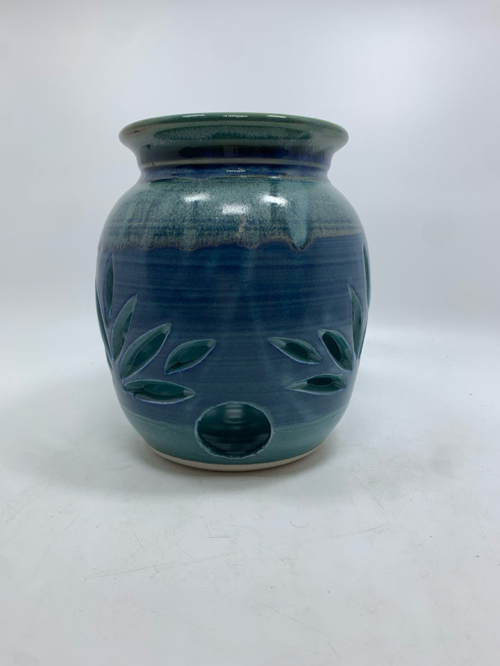 LEAF CUT-OUT BLUE GLAZED CANDLE HOLDER.