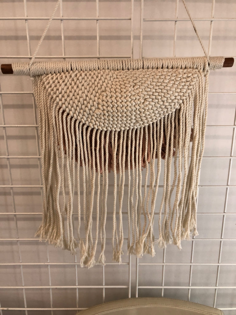 MACRAME ON WOOD DOWEL ROD W/PINK AND BEADED ACCENTS.