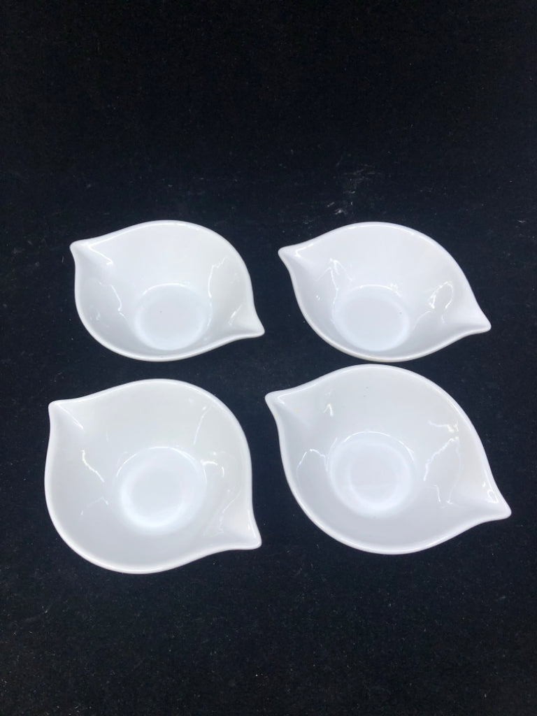 4 EYE SHAPED SAUCE CUPS.