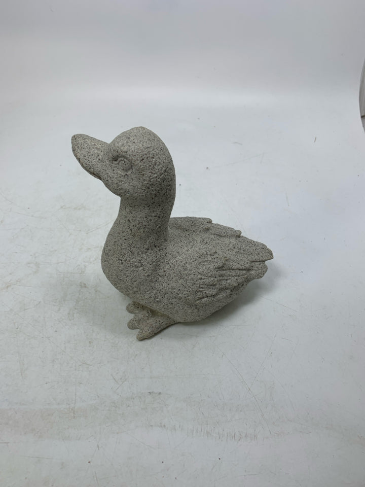 CEMENT DUCK W/ TEXTURED WING FEATHERS.