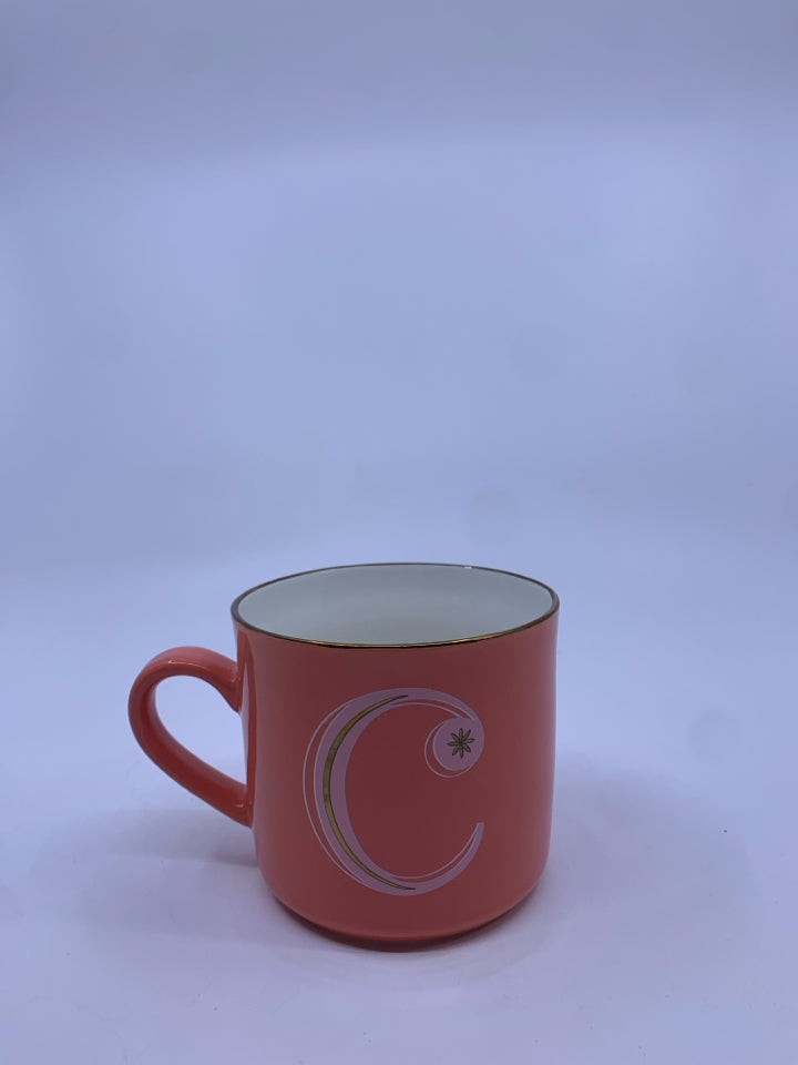 SALMON COLORED MUG W/ GOLD "C".