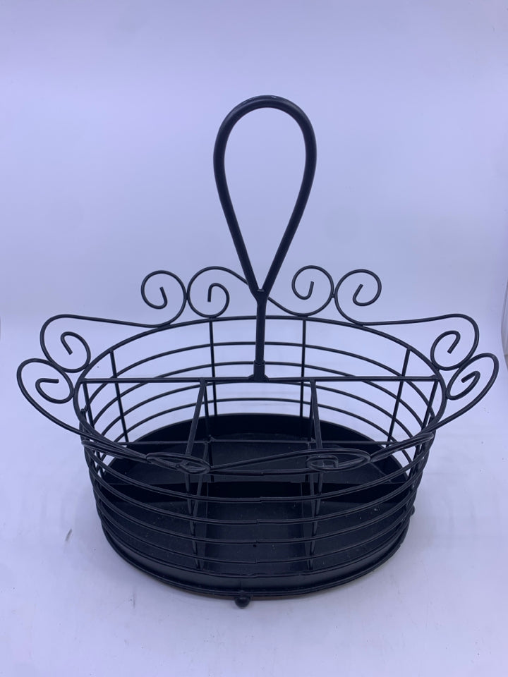 BLACK METAL DIVIDED OVAL UTENSIL HOLDER W/ HANDLE IN CENTER.