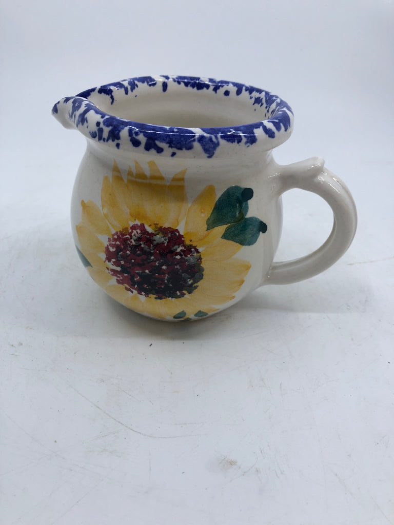 POTTERY WHITE PITCHER W/ PAINTED SUNFLOWER BLUE SPONGE EDGE.