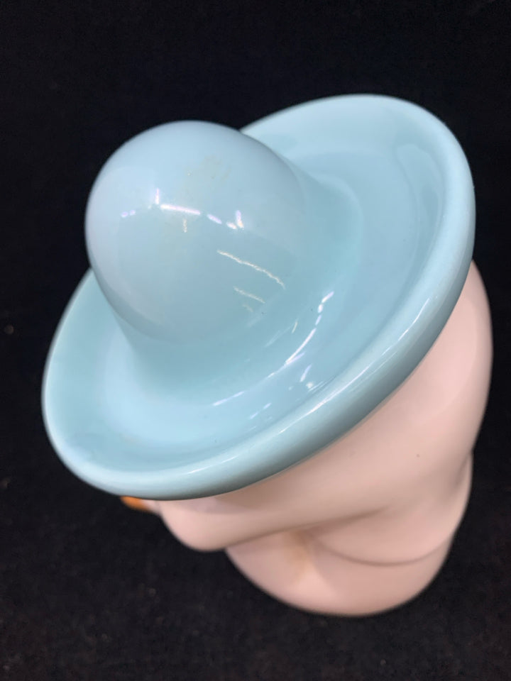 SLEEPING MAN WHITE W/TEAL SOMBRERO.