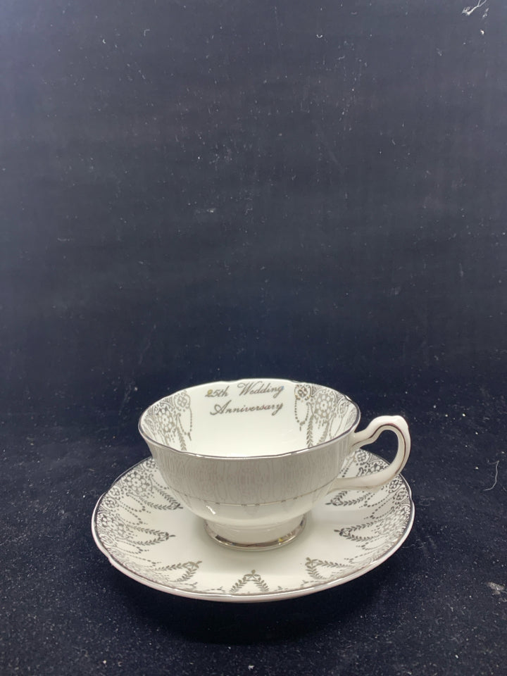 VTG WHITE SILVER TEACUP AND SAUCER.