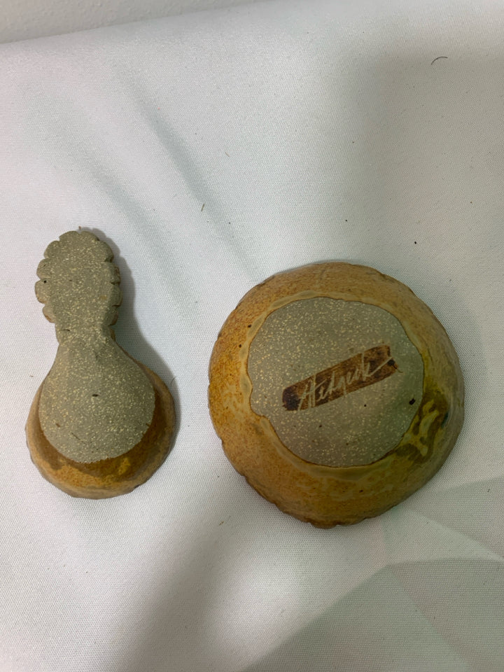 SMALL TAN POTTERY BOWL W SPOON.