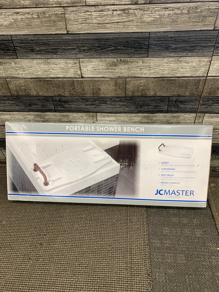 NIB PORTABLE SHOWER BENCH.