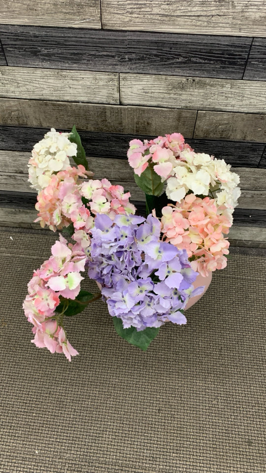 FAUX PINK HYDRANGEA IN LARGE PINK GLASS VASE.
