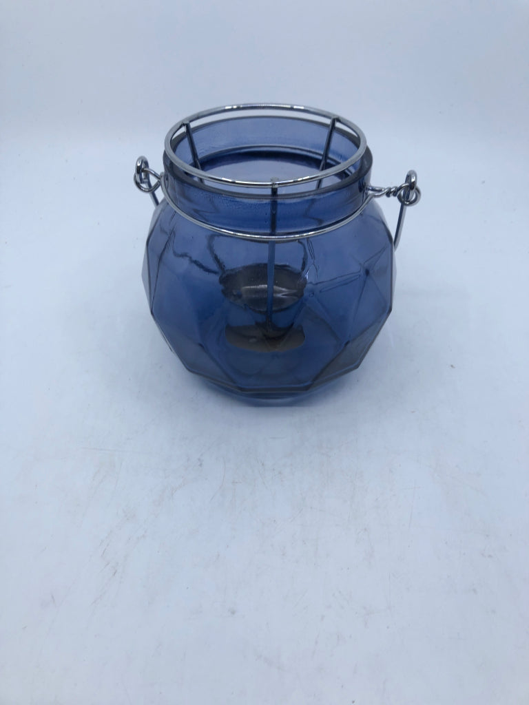 BLUE GLASS TEA LIGHT HOLDER W HANDLE.