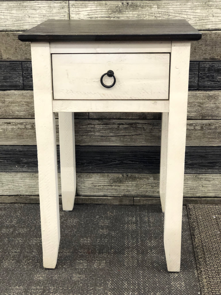 SMALL WHITE SIDE TABLE W 1 DRAWER AND DARK WOOD TOP.