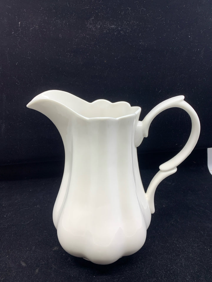 WHITE RIBBED PITCHER.