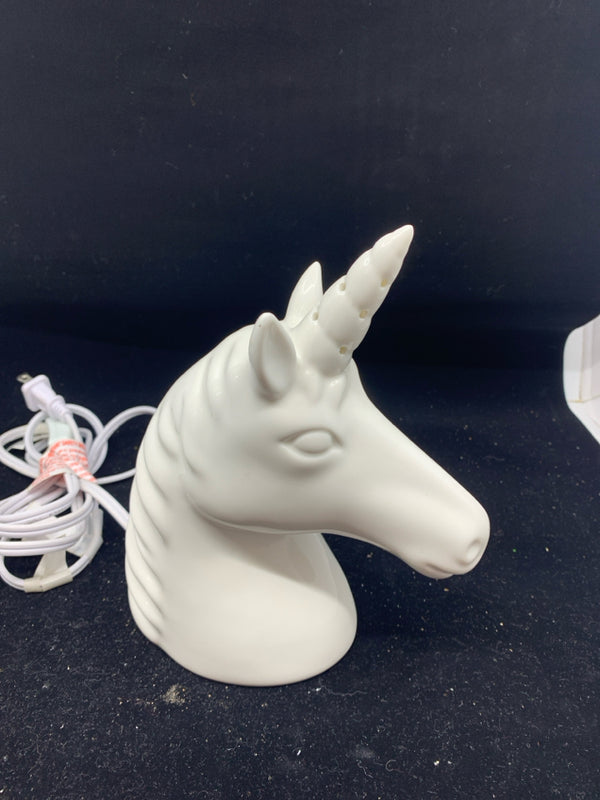 WHITE CERAMIC UNICORN LIGHT.