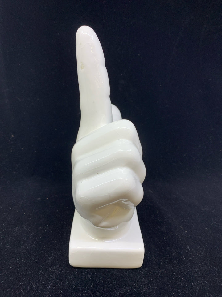 WHITE L SHAPED HAND FIGURE.