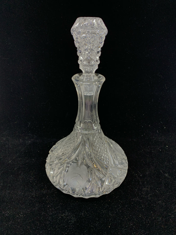 CUT GLASS EMBOSSED W/FLOWERS.