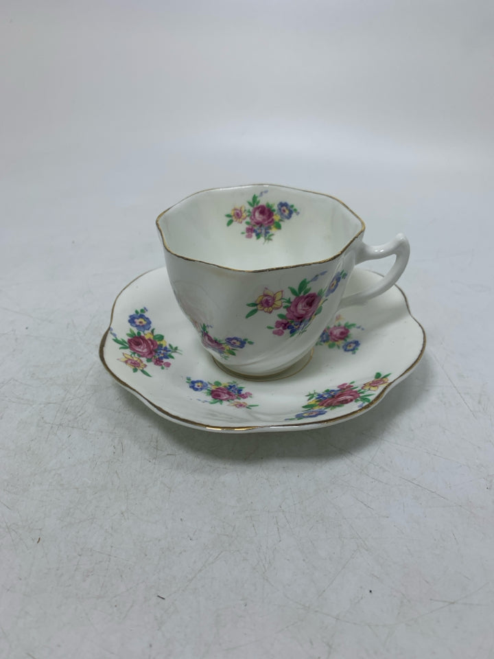 ASSORTED FLOWERS W/ GOLD RIM.