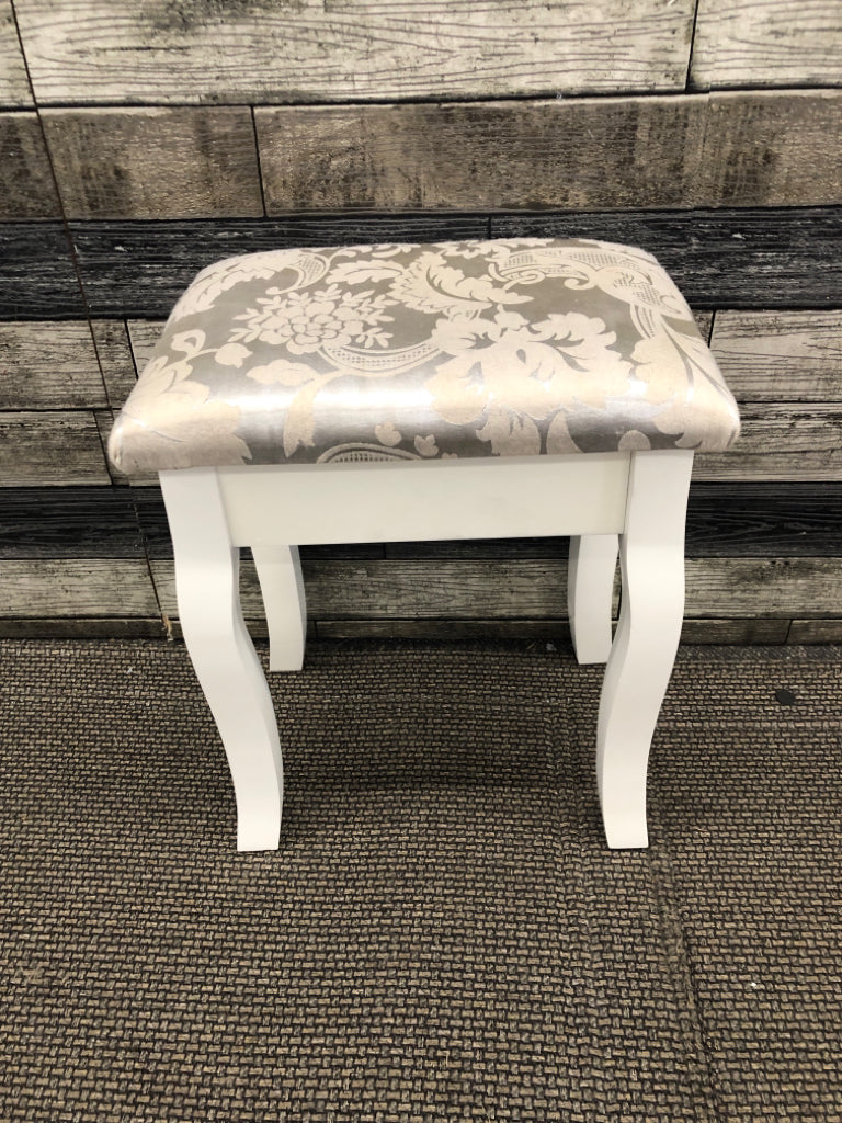SILVER FLORAL VANITY STOOL W/WHITE WOOD BASE.