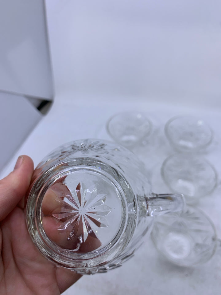 6 SHORT GLASS CUPS W/ STAR PATTERN.
