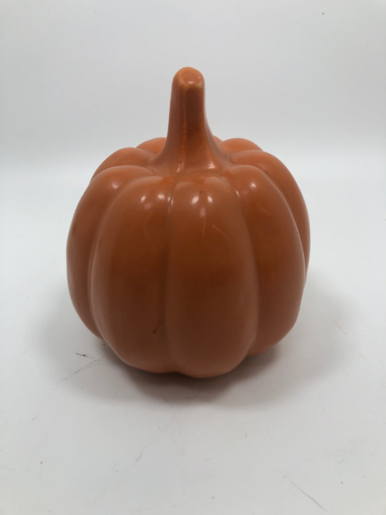 ORANGE CERAMIC PUMPKIN FIGURINE.
