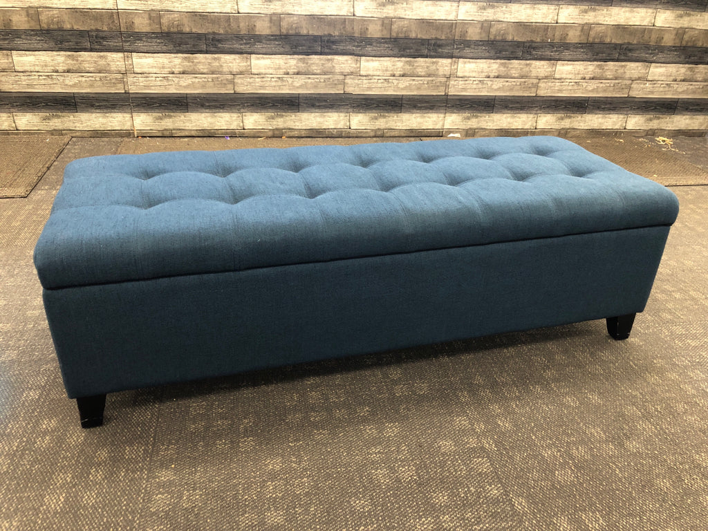 BLUE FABRIC STORAGE BENCH.