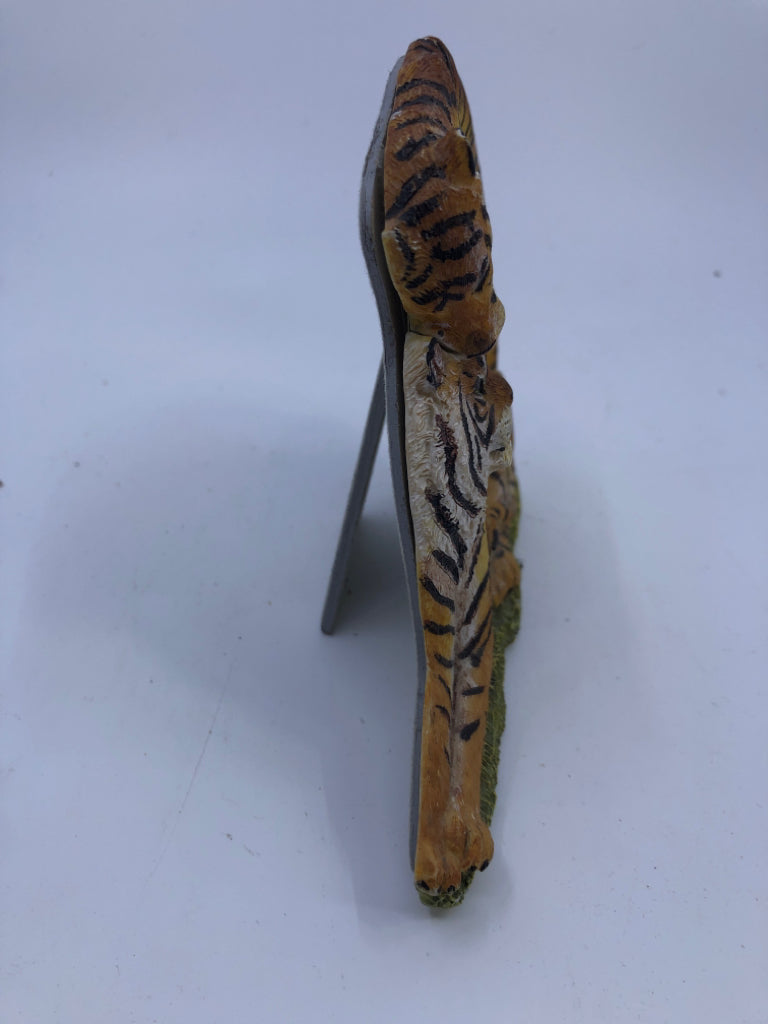 OVAL RESIN TIGER FRAME.