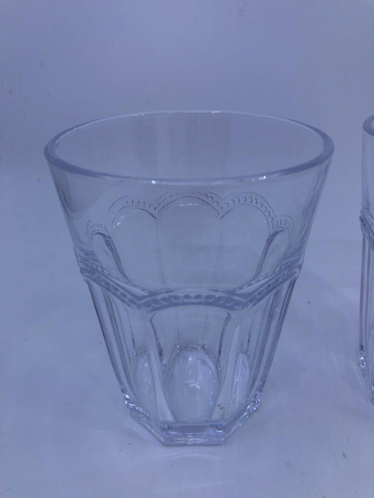 4 JUICE GLASSES W/ BEADED SCALLOP DETAIL.