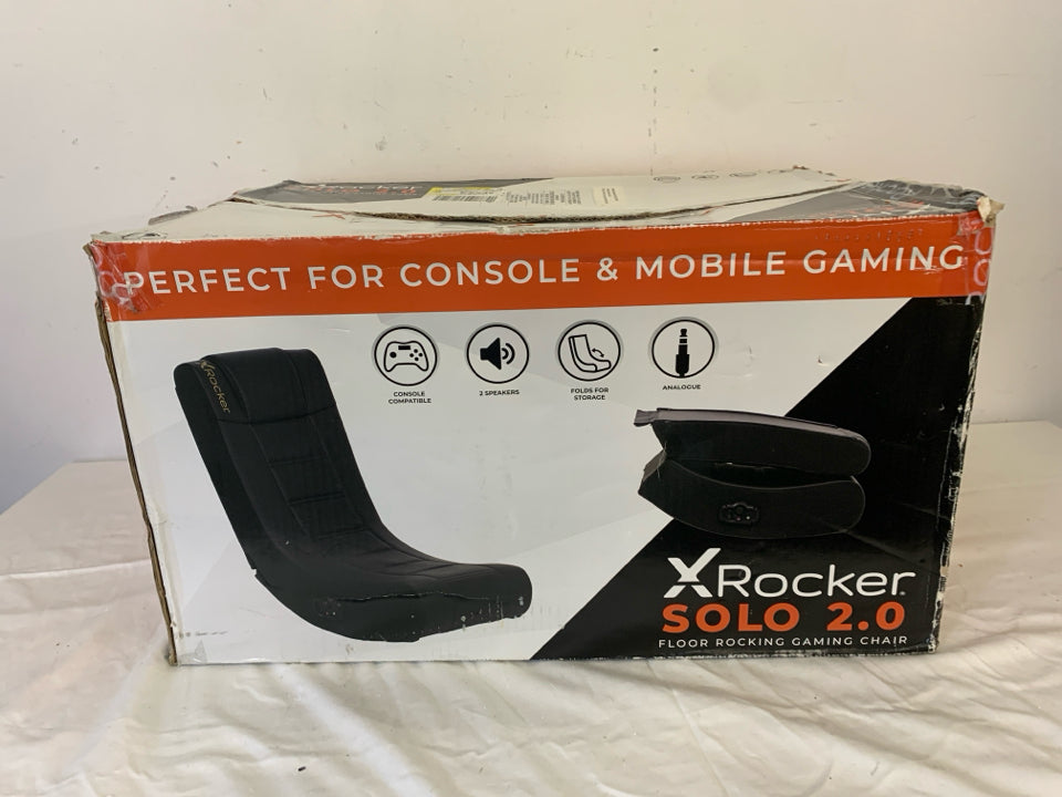 NIB ROCKER GAMING CHAIR.