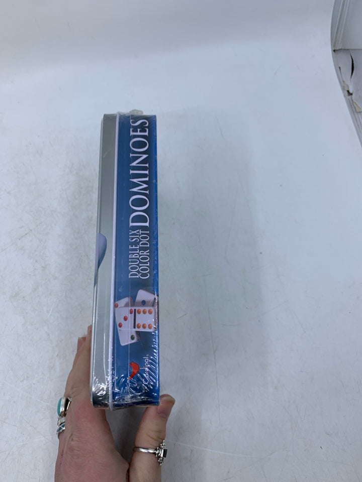 NIP DOUBLE SIX COLOR DOMINOES.