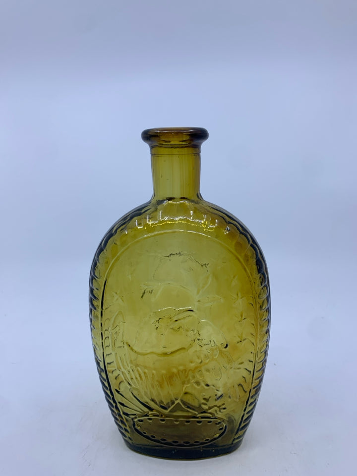 VTG GREEN GLASS EMPTY BOTTLE W EMBOSSED FACE.