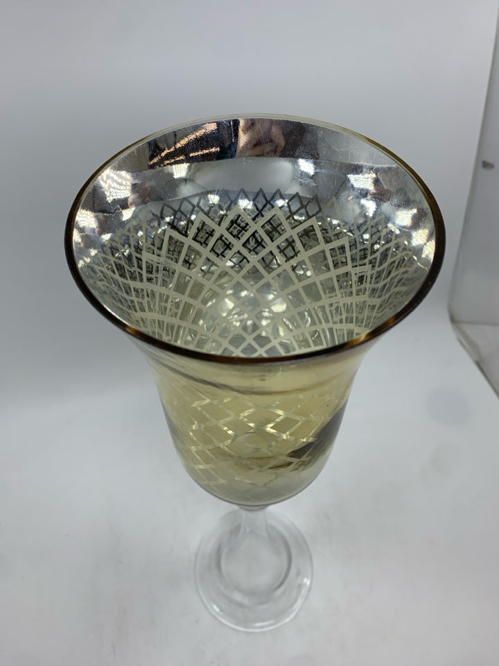 METALLIC PEDESTAL CANDLE HOLDER.