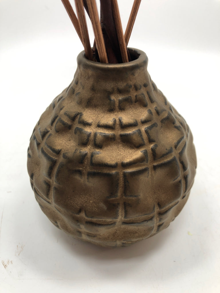 ROUND BRASS PAINTED BUD VASE W/FAUX TWIGS.