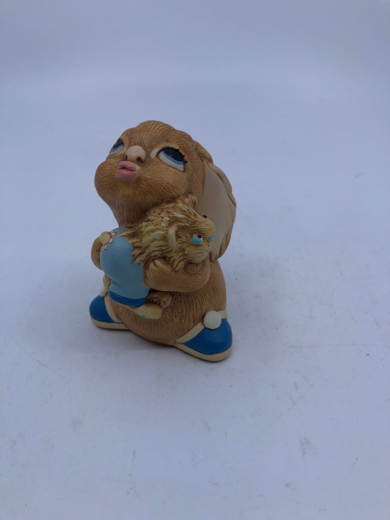 VTG PENDELFIN BUNNY IN BLUE SHORTS AND HOLDING LION.